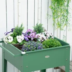 Outsunny Huerto Urbano Elevado Con Ruedas Jardinera Exterior De Acero Galvanizado 64x55x79 Cm Con Estante Y Asa Lateral Para Cultivo Plantas Flores Verduras Verde -OUTSUNNY TIENDA 14842978019415da100d45e314c65ecfd5f5abf1 b05bd37b6a044395b12c0cda80d999fb